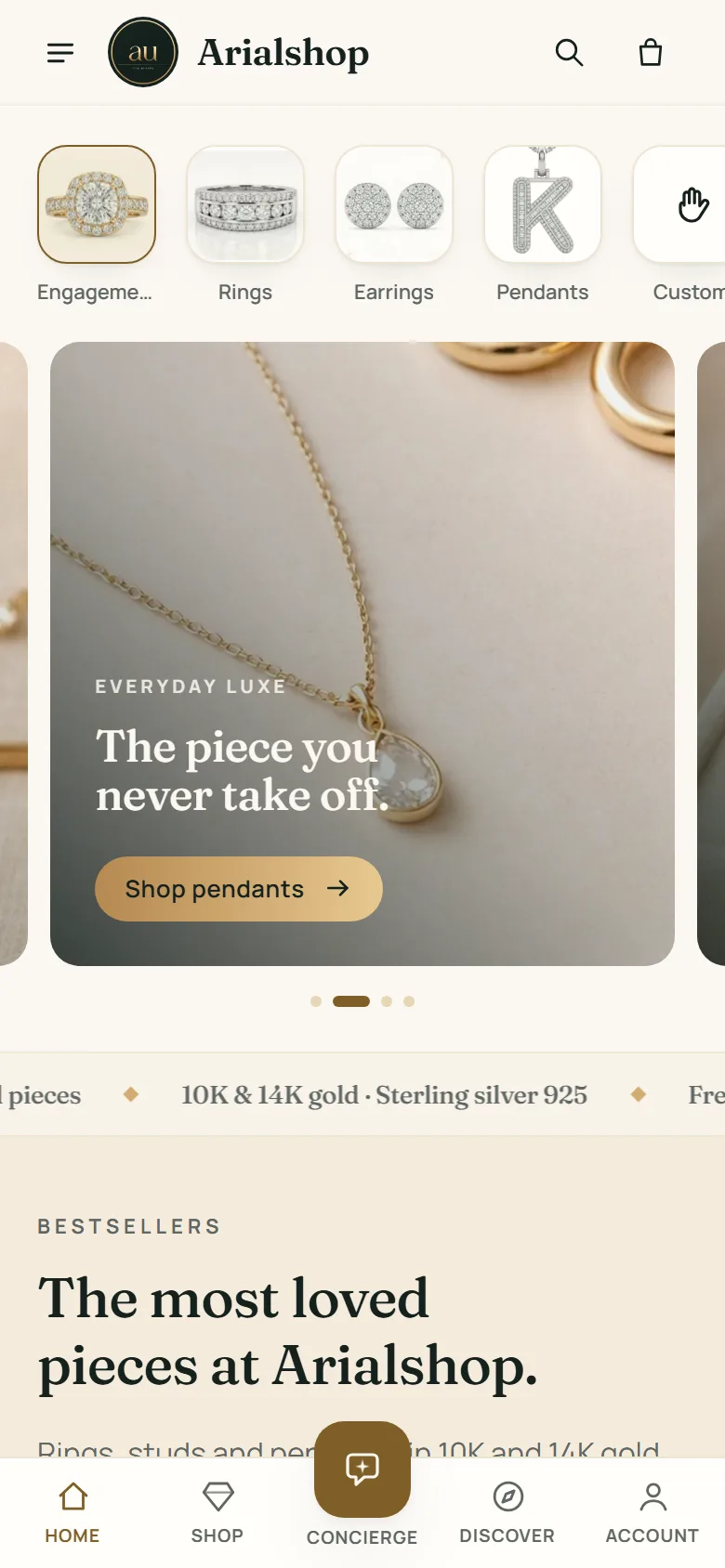 The Arialshop storefront on a phone: category tiles for engagement, rings, earrings and pendants across the top, a jewellery hero reading The piece you never take off with a shop pendants button, a bestsellers section below, and a bottom navigation bar.